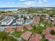 Aerial view of the community showing numerous buildings, pool, and landscaping at 110 Vista Hermosa Cir # 302B, Sarasota, FL 34242