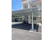 Assigned carport space provides covered parking for the property's residents and guests at 110 Vista Hermosa Cir # 302B, Sarasota, FL 34242