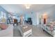 Spacious living room with a combination of seating options and open to the kitchen and dining area at 110 Vista Hermosa Cir # 302B, Sarasota, FL 34242