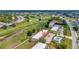 Aerial view showcasing the property's proximity to a golf course and community pool at 1216 Rio De Janeiro Ave # 306, Punta Gorda, FL 33983