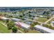 An aerial view captures the property amidst a neighborhood, showcasing its layout and surroundings at 1216 Rio De Janeiro Ave # 306, Punta Gorda, FL 33983