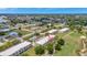 An aerial perspective highlights the property's location near a golf course and neighborhood amenities at 1216 Rio De Janeiro Ave # 306, Punta Gorda, FL 33983