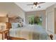 Large bedroom with comfortable queen size bed and scenic outdoor views at 1216 Rio De Janeiro Ave # 306, Punta Gorda, FL 33983