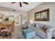 Comfortable living room area with access to the kitchen and dining room at 1216 Rio De Janeiro Ave # 306, Punta Gorda, FL 33983