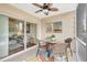 Screened patio with furniture, ceiling fan, and views to living area at 1216 Rio De Janeiro Ave # 306, Punta Gorda, FL 33983