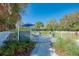 Enclosed dog park with separate areas for small and large breeds, perfect for pet owners to socialize at 12229 Stuart Dr, Venice, FL 34293