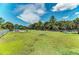 Community dog park featuring agility equipment, shade, and a fully fenced-in area at 12229 Stuart Dr, Venice, FL 34293