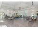 Community gathering area with natural light and several seating groups at 12229 Stuart Dr, Venice, FL 34293