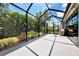 Spacious screened patio with clear views, providing an airy and enjoyable outdoor experience at 12229 Stuart Dr, Venice, FL 34293