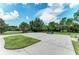 Grand Palm's community features a hopscotch play area, picnic tables, and benches, promoting active outdoor fun for families at 12229 Stuart Dr, Venice, FL 34293