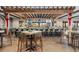 Stylish bar area with comfortable seating, multiple TVs, and a well-stocked bar at 12856 Sorrento Way, Bradenton, FL 34211