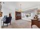 Dining room with traditional furnishings, built-in display cabinet, and bright window seat at 1304 Alton Rd, Port Charlotte, FL 33952