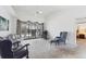 Spacious living room with ceiling fan, comfortable seating, and sliding doors leading to outdoor pool area at 1304 Alton Rd, Port Charlotte, FL 33952