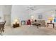 Spacious living room with vaulted ceilings and an open floor plan, decorated with classic furniture at 1304 Alton Rd, Port Charlotte, FL 33952