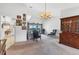 Open living space featuring a hutch and seamless transition to the kitchen and lanai at 1304 Alton Rd, Port Charlotte, FL 33952