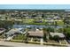 Stunning aerial view of waterfront homes along a canal, showcasing private docks and lush landscaping at 149 Small Se St, Port Charlotte, FL 33952
