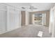 This bedroom features sliding glass door pool access and two large closets at 149 Small Se St, Port Charlotte, FL 33952