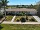Charming single-story home features a well-manicured front yard and a welcoming entrance at 149 Small Se St, Port Charlotte, FL 33952