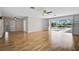Spacious living room with hardwood floors and sliding doors that showcase the outdoor pool at 149 Small Se St, Port Charlotte, FL 33952