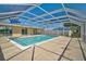Large screened pool area with covered lanai and spacious patio for relaxing and entertaining at 149 Small Se St, Port Charlotte, FL 33952