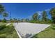 Well-maintained sand volleyball court provides recreational fun for residents at 15033 Shady Palms Ln, Nokomis, FL 34275