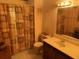 Cozy bathroom with white tile floors and single vanity at 1511 11Th W Ave, Palmetto, FL 34221
