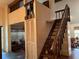 View of the interior with wooden staircase and open floorplan at 1511 11Th W Ave, Palmetto, FL 34221
