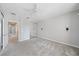 Empty bedroom with carpet floors and a wall mirror at 1519 Napoli E Dr, Sarasota, FL 34232