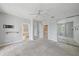 Empty main bedroom with carpet flooring and a wall mirror at 1519 Napoli E Dr, Sarasota, FL 34232