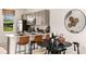 Bright kitchen with an island, breakfast bar, stainless steel appliances, and modern finishes at 16646 San Nicola Pl, Bradenton, FL 34211