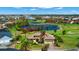 Aerial view of a beautiful home near a golf course and pond in a desirable neighborhood at 1736 Suzi St, Punta Gorda, FL 33950