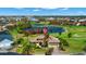 Aerial view of a beautiful home near a golf course and pond in a desirable neighborhood at 1736 Suzi St, Punta Gorda, FL 33950