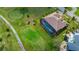 Aerial view of a home with a screened pool and beautiful golf course surroundings at 1736 Suzi St, Punta Gorda, FL 33950