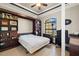 Flex room featuring a built in murphy bed, work desk and bookshelves at 1736 Suzi St, Punta Gorda, FL 33950