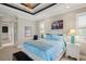 Bedroom with a ceiling fan, night stands, and a queen size bed at 1736 Suzi St, Punta Gorda, FL 33950