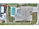 Overhead shot of a home with pool and surrounding greenery, offering privacy at 1801 Forest Dr, Oldsmar, FL 34677