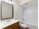 Bathroom featuring a vanity, toilet, and shower with a white subway tile surround at 1801 Forest Dr, Oldsmar, FL 34677