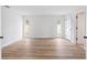 Bright bedroom with new flooring, chair rail detail, and ample natural light at 1801 Forest Dr, Oldsmar, FL 34677