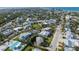 Coastal home in a dense neighborhood with lush landscaping and views of the Gulf of Mexico at 221 85Th St, Holmes Beach, FL 34217