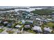 Coastal home nestled among lush landscaping with views of the bay and surrounding community at 221 85Th St, Holmes Beach, FL 34217