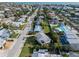 Aerial view of a neighborhood with homes and mature landscaping at 221 85Th St, Holmes Beach, FL 34217