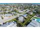 Aerial view of a neighborhood with homes and mature landscaping at 221 85Th St, Holmes Beach, FL 34217