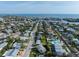 Coastal home in a dense neighborhood with lush landscaping and views of the Gulf of Mexico at 221 85Th St, Holmes Beach, FL 34217