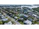 Coastal home nestled among lush landscaping with views of the bay and surrounding community at 221 85Th St, Holmes Beach, FL 34217