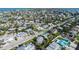 Home in a dense neighborhood with lush landscaping and views of the Gulf of Mexico at 221 85Th St, Holmes Beach, FL 34217