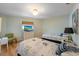 Bright bedroom with two twin beds and hardwood floors at 221 85Th St, Holmes Beach, FL 34217