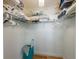 Organized walk-in closet with white shelving and ample storage space at 221 85Th St, Holmes Beach, FL 34217