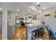 Modern kitchen with stainless steel appliances, counter seating and plenty of cabinet space, with an 'eat sleep fish' sign at 221 85Th St, Holmes Beach, FL 34217