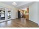 Dining area with stainless steel refrigerator and view of outdoor patio at 2477 Wood Oak Dr, Sarasota, FL 34232