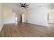Spacious and bright living room featuring wood-look flooring at 2477 Wood Oak Dr, Sarasota, FL 34232
